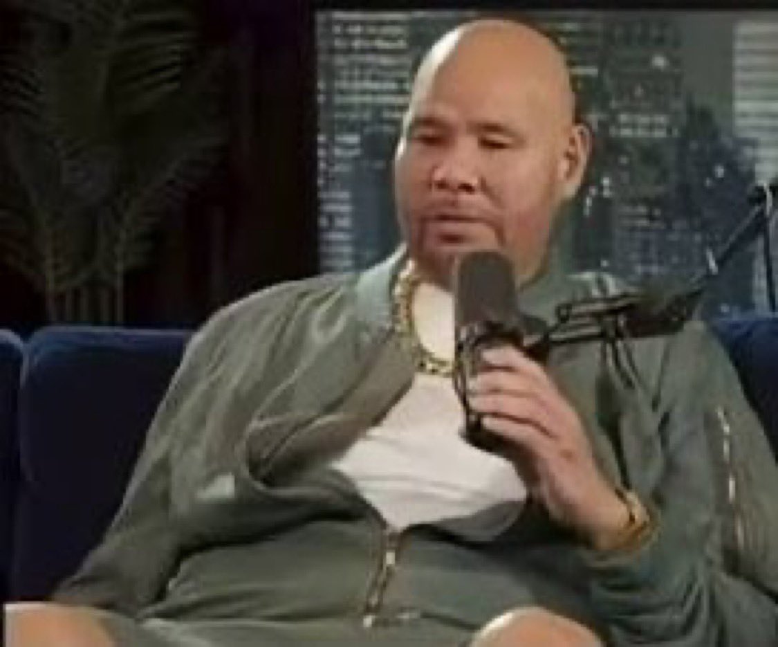 g herbos arm in his picture with farrakhan tweet media