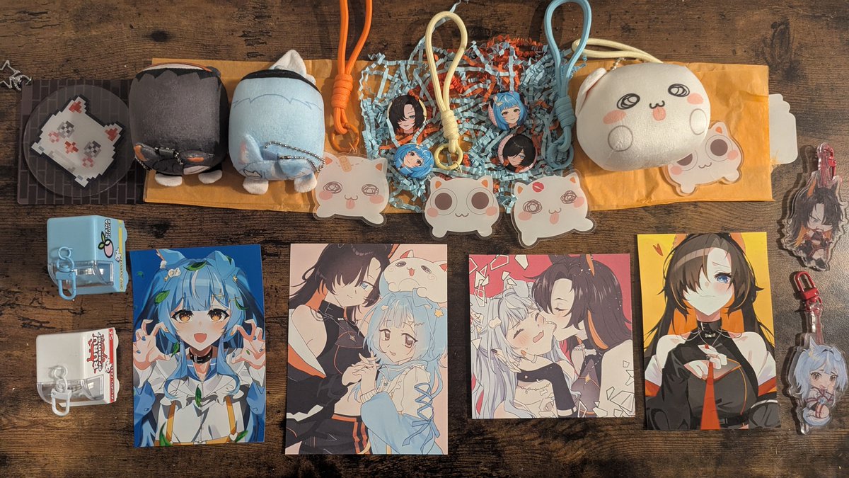 xpointfive's tweet photo. My @NanaruruVT collection grows! Includes all their birthday merch from their first year of streaming + their first official merch drop. I'm so proud of my kami oshis <3 https://t.co/wQq2xuLW9a