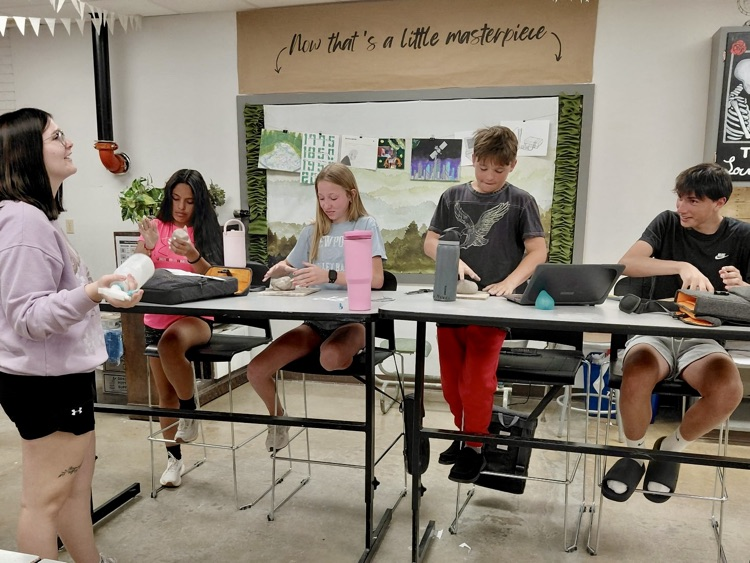 PCS_Pride's tweet image. Leave it to Ms. Tate (substitute teacher for Mr. Stephenson while he's coaching at a track meet) to introduce a little mentorship in Art.  The Art 4 students are introducing clay projects to the Art 1 class.  #plainsmenpride  #SupportTheArts