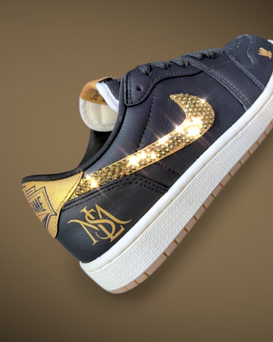 MACHE275's tweet photo. Before she’s inducted into the #wwehof this weekend I had the honor to create these custom Jordan 1s for @StephMcMahon. Kept them clean with the black and gold colorblocking and added Swarovskis to the swooshes to give them just a little something more. 

📸 @WWE https://t.co/BSChV45PoI