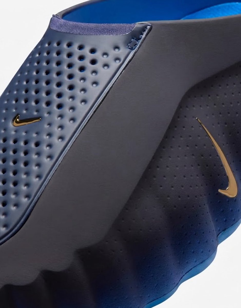 Here are official images of the “Blackened Blue” Nike Mind 001