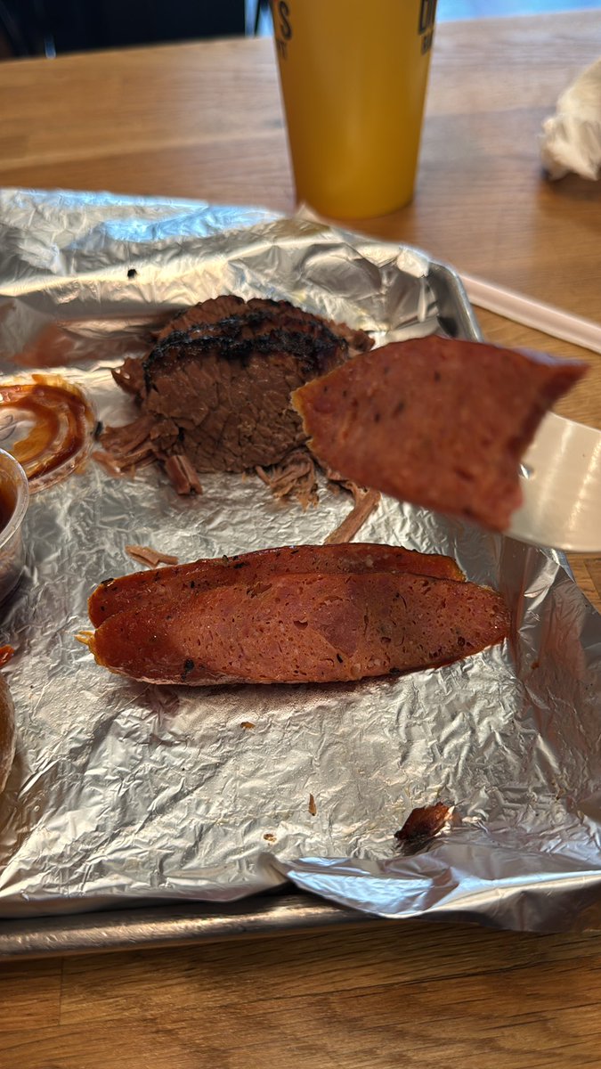 WTFDamo's tweet photo. @Dickeys what’s with the terrible beef wiener masquerading as the “beef sausage” in Edmonton Alberta??? This not being able to have pork either is annoying.   What started with some good energy has turned into a joke here.  Nothing Texas about the food here anymore https://t.co/XkAwTrobQE