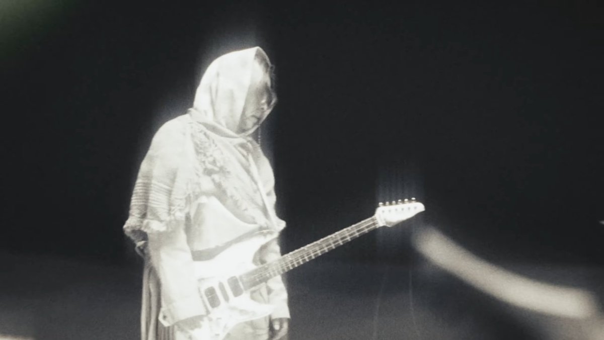 Ternyata bener ya.. he was stranded alone in the spaceship, writing what seems like music notes/codes like he always did before, playing imageries in his head that he was still playing with his bandmates.. but in reality they're already gone, and he's growing old on his own..