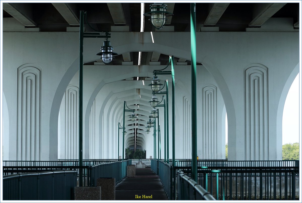 IkeHarel's tweet image. A Cathedral ? no, its a view under a  bridge.
#Picture taken on a boardwalk under the Merrill Barber bridge, Vero-beach, #Florida.
27.6532,-80.37036 on the map.
06/05/2022
📷Canon 60D, EF70-200
#photography 
***
Added a distant view of the bridge.
.../2