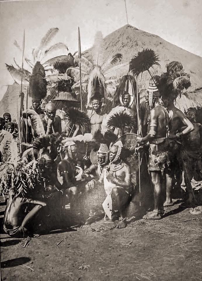 1927: Luo warriors and elders photographed in their traditional dress.

Ostrich feathers, besides raffia and beads, constituted a prominent part of the Luo male headdress.