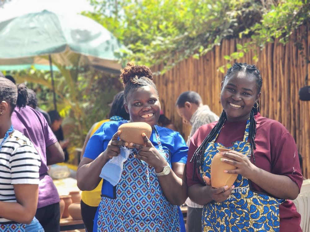 Emata_UG's tweet photo. Last week, our team painted – and made – pots together.

Not the most extreme thing we've done (that title probably goes to VR combat in Busiika, or the shooting range in Nakawa).

Let's talk about why we think laptop breaks are critical for us to do our job well! 👇 https://t.co/uEhBrIPx24