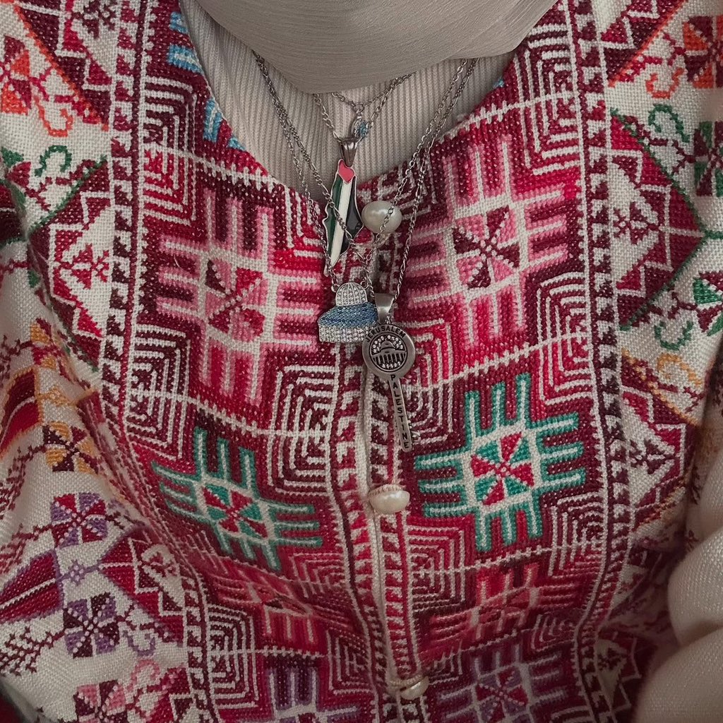 doaax__'s tweet photo. When I wear our heritage, I feel as though I am wearing our roots, the history of our ancestors, and that I am renewing my pledge to hold fast to the land, our identity, and our cause. #FreePalestine #Gaza 
#OurHeritageIsOurIdentity #NoPeaceWithIsrael https://t.co/MtNCqtcsK2