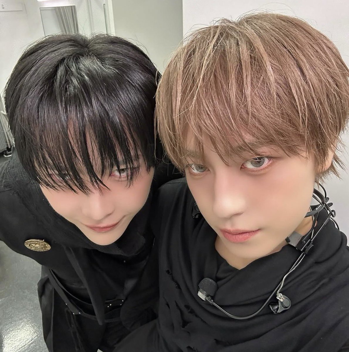 3 gay people looking at each other