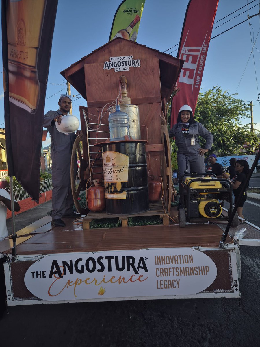 Angosturatt's tweet photo. Angostura, through its distributor Fine Foods Inc., has secured 1st Place for Best Carnival Business Float at Dominica’s national Carnival opening parade, Mas Domnik. 

The award-winning Best Carnival Business Float design reflected Angostura’s legacy, innovation, and craftsmanship, featuring key elements such as a boiler house, chimney stack, and aged rum casks, alongside oversized bottle installations. 

The float showcased some of Angostura’s core brands such as Angostura Single Barrel® and the newest addition to the portfolio, 420, reinforcing strong brand visibility and premium positioning. 

#Angostura
#masdomnik2026
