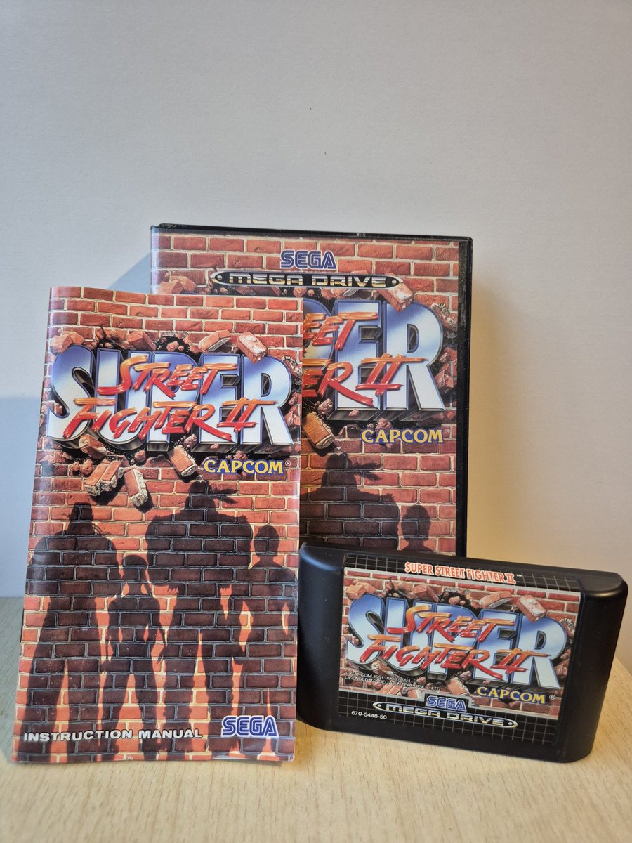 MrTomFum's tweet image. Fresh new get today. Been after it for awhile but most of them have no manual. £30 later jobs a gooden. Wouldn't mind the blue spine version as well at some point  #superstreetfighter2 #segamegadrive