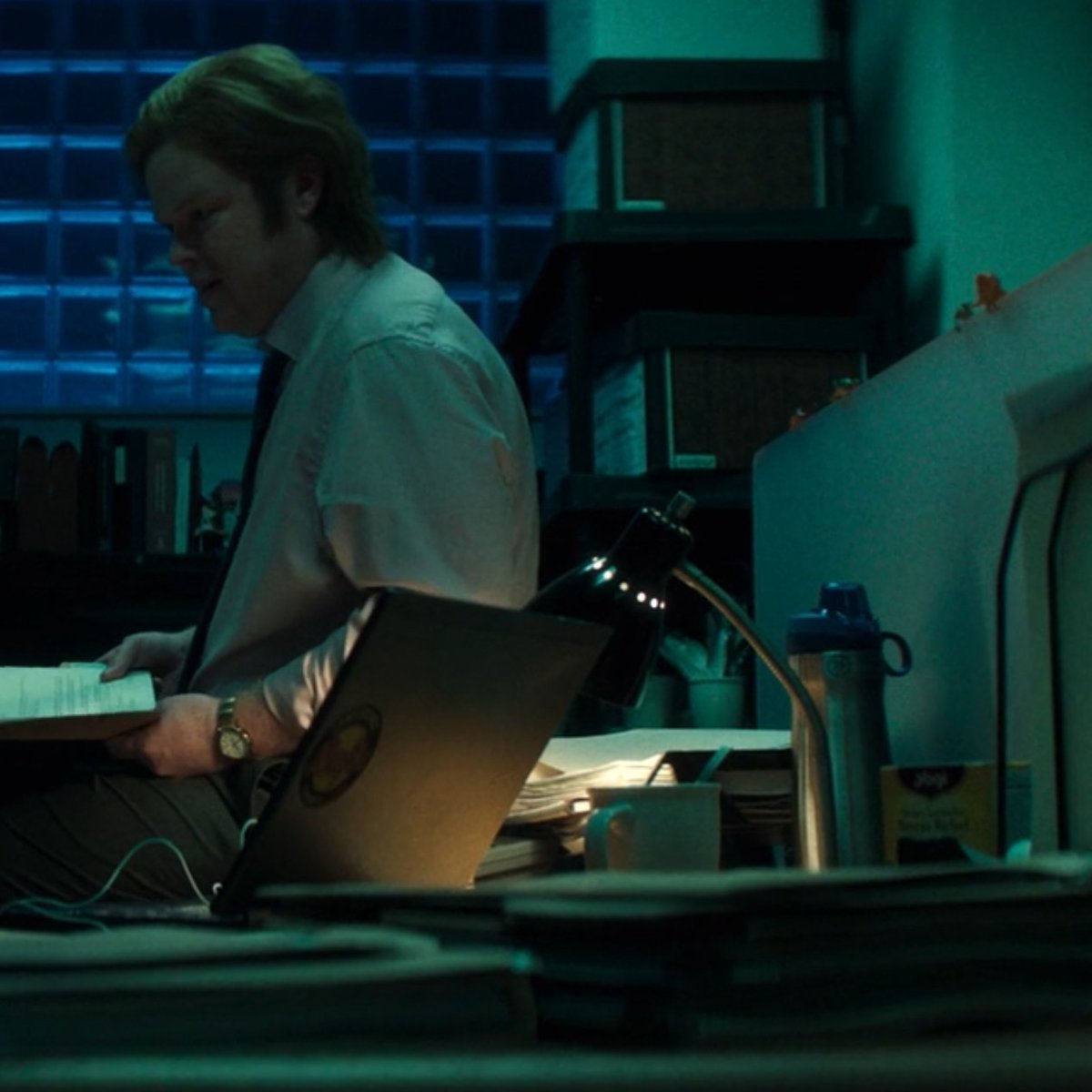 There are three objects on Matt's desk at Landman &amp; Zack that appear in both flashbacks.

A white mug
A thermos bottle
A box of tea

And of course, the little dinosaurs on the divider.

#DaredevilBornAgain