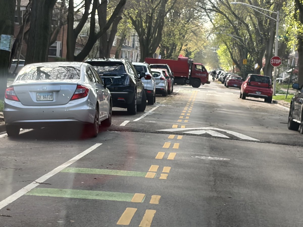 publicpolicyman's tweet photo. SPEED BUMPS ON BIKE LANES?   What idiot traffic engineer puts speed bumps here? The whole bike lane experiment is a disaster costing millions making it no safer for cars, pedestrians, or bikes. 

CITY of CHICAGO COMPLETELY MISMANAGED: The: city continues an a downward spiral with empty storefronts, never ending road construction, increasing taxes, building bump outs & bike lanes. massive retail thief, & violent crime. Much of the blame is on the leadership of the mayor, governor, 50 aldermen, 177 state legislators, county officials, prosecutors, judges, & the media. #EmptyStoreFrontProject