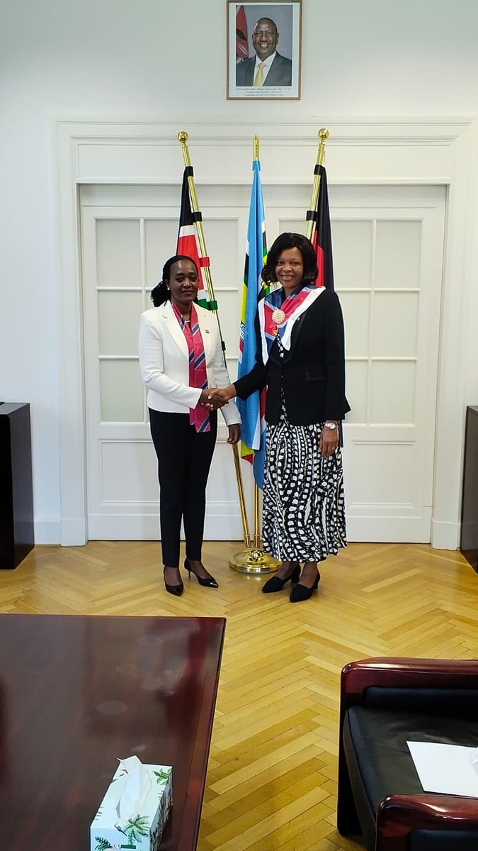 KenyaembassyGER's tweet photo. National Defence College (NDC) Delegation Pays Courtesy Call to the Embassy of Kenya in Berlin
Ambassador Stella Mokaya Orina today 17th April 2026 hosted Hon. Soipan Tuya, Cabinet Secretary for Defence who paid a courtesy call to the Embassy. The Cabinet Secretary led a delegation comprising the NDC Commandant, Lt. Gen. Mwinyikai Juma Shee, Maj. General Peter Githinji Nyamu,  Colonel Damaris Agneta Ochieng, the Defence Attachè to Germany, and a team of 23 NDC participants drawn from different sectors in  Kenya, Rwanda, Uganda, and Tanzania. The delegation which has been on a study tour in Germany  had visited strategic institutions, including the Federal Ministry of Defence, the Federal Foreign Office, Konrad Adenauer Stiftung, and the Centre for International Peace Operations (ZIF), among others.
The discussions centred aroubd the role the NDC plays in developing strategic leaders for the country and region.  Germany was also hailed as Kenya’s strategic partner on climate action, renewable energy, sustainable economic growth all of which have a security dimension.