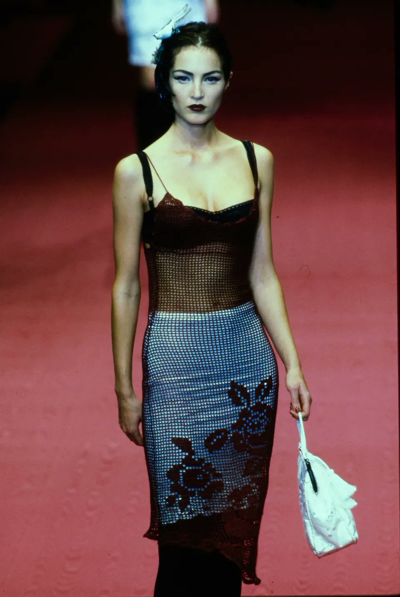 forbrittain's tweet photo. F/W 1997 Dolce &amp; Gabbana cut-out knit top, where the rose floral seen all over the runway that season emerges when stretched across the body. completely sheer other than the molded cups at the chest. now available. https://t.co/jpR7Nz8IAd