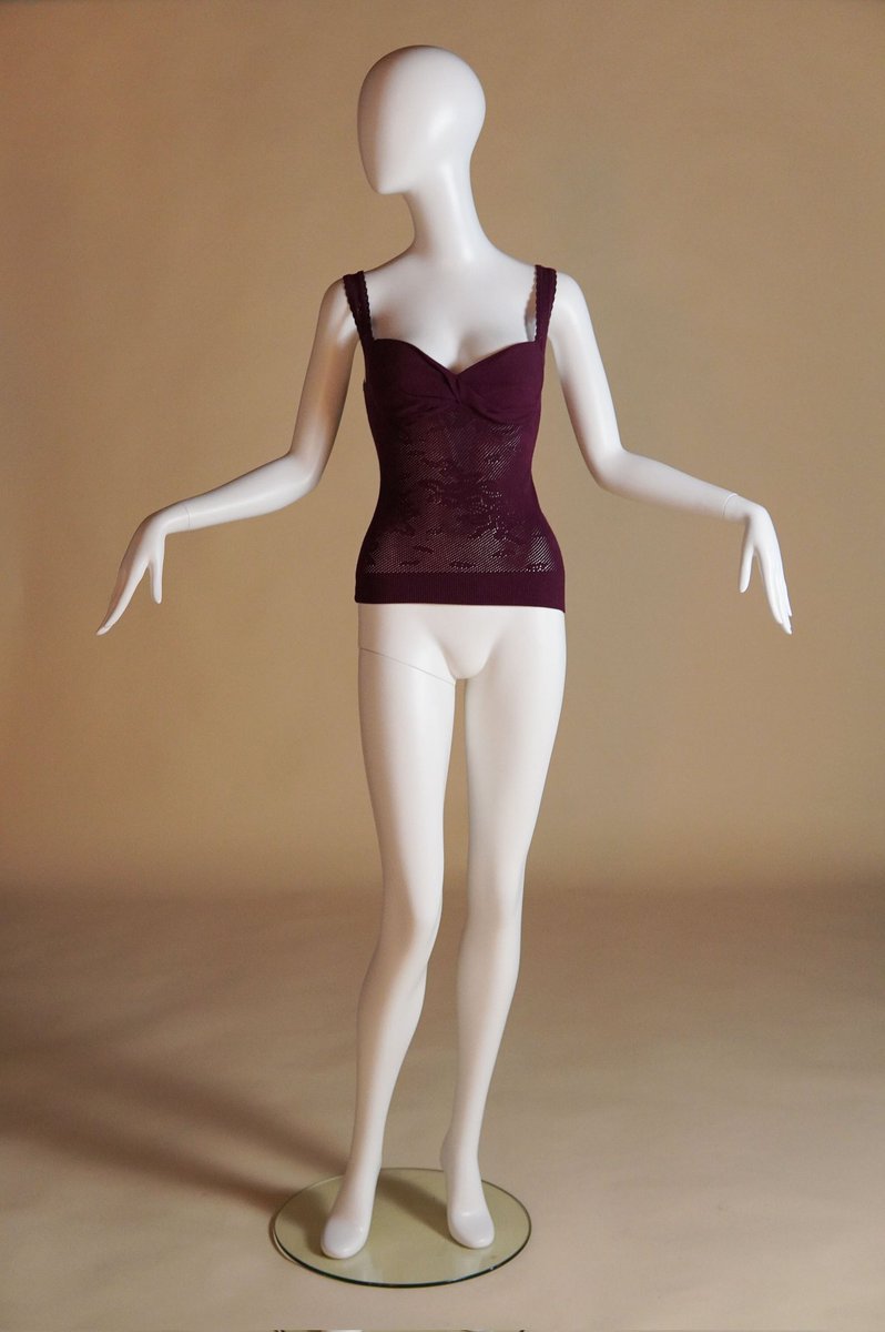 forbrittain's tweet photo. F/W 1997 Dolce &amp; Gabbana cut-out knit top, where the rose floral seen all over the runway that season emerges when stretched across the body. completely sheer other than the molded cups at the chest. now available. https://t.co/jpR7Nz8IAd