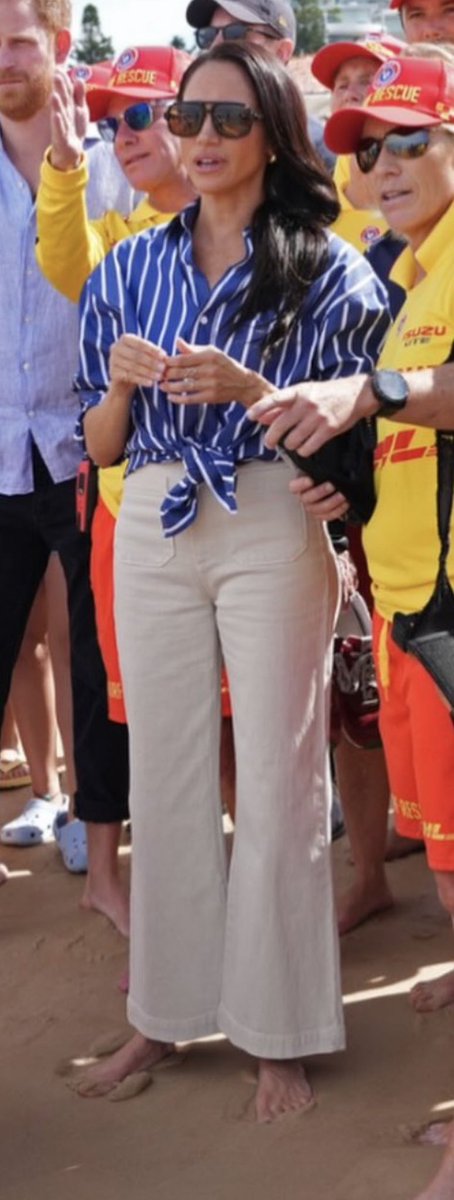 unreMARKLEble's tweet image. Separately and fitted properly, these would be just fine. However-the shirt tied at the waist only highlights #MeghanMarkle’s short torso. The pants are so tight she’s in camel toe territory,  and they are both wide-legged and high waters which is a bad combo. 
 If she had styled