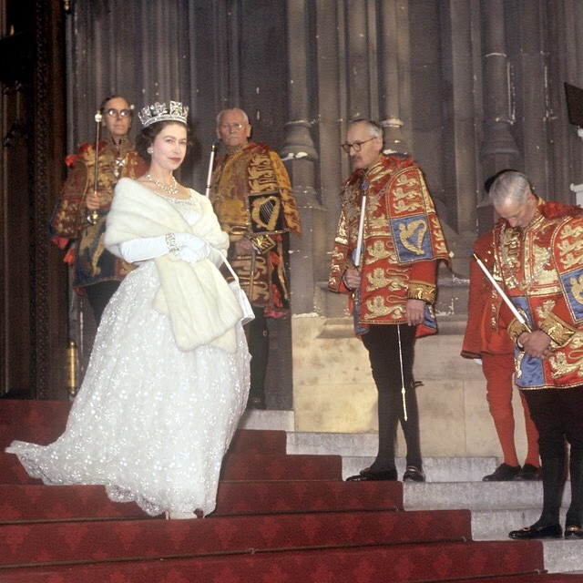 Queen Elizabeth II leaving the Palace of Westminster after the State Opening of Parliament on November 3, 1964....Ceremonial First: The event was significant for being televised and broadcast, following the precedent set in 1958