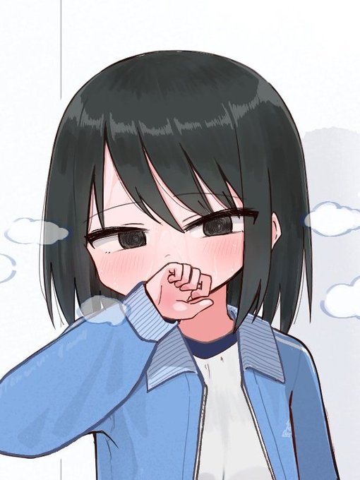 手の甲で口元を拭いてる女の子 