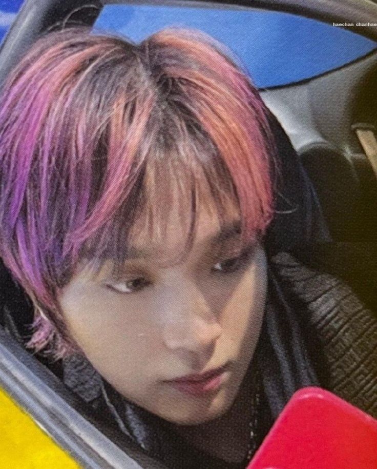 Grape lollipop i lick to reveal the bubblegum inside