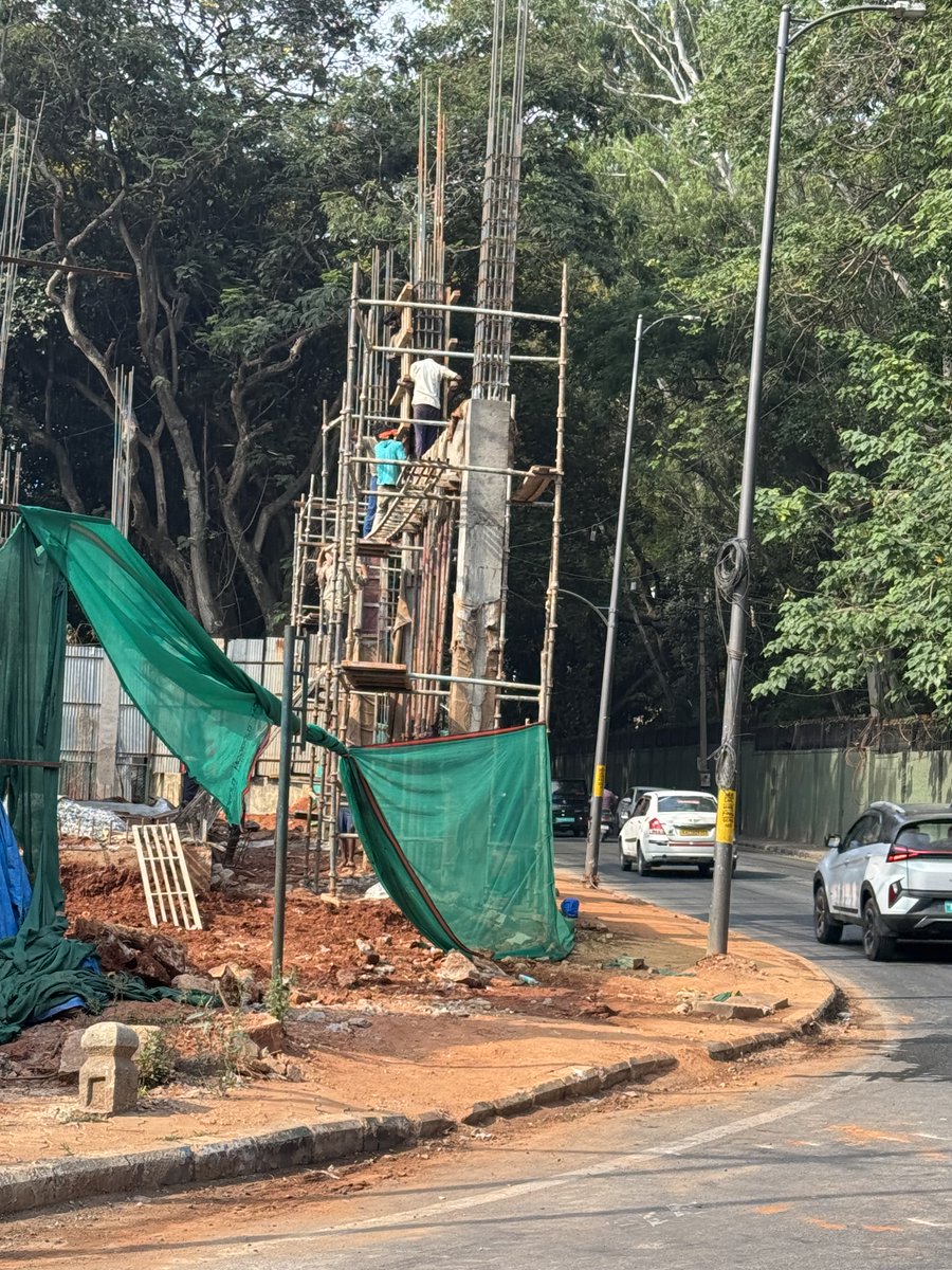 ⁦<a href="/GBAChiefComm/">Maheshwar Rao.M, IAS</a>⁩ ⁦<a href="/GBA_office/">Greater Bengaluru Authority</a>⁩ Illegal construction on govt property by govt contractor on Ali Asker Road.Huge pillars at edge of footpath, no set back. Please intervene Uphold GBA Rules ⁦<a href="/DKShivakumar/">DK Shivakumar</a>⁩