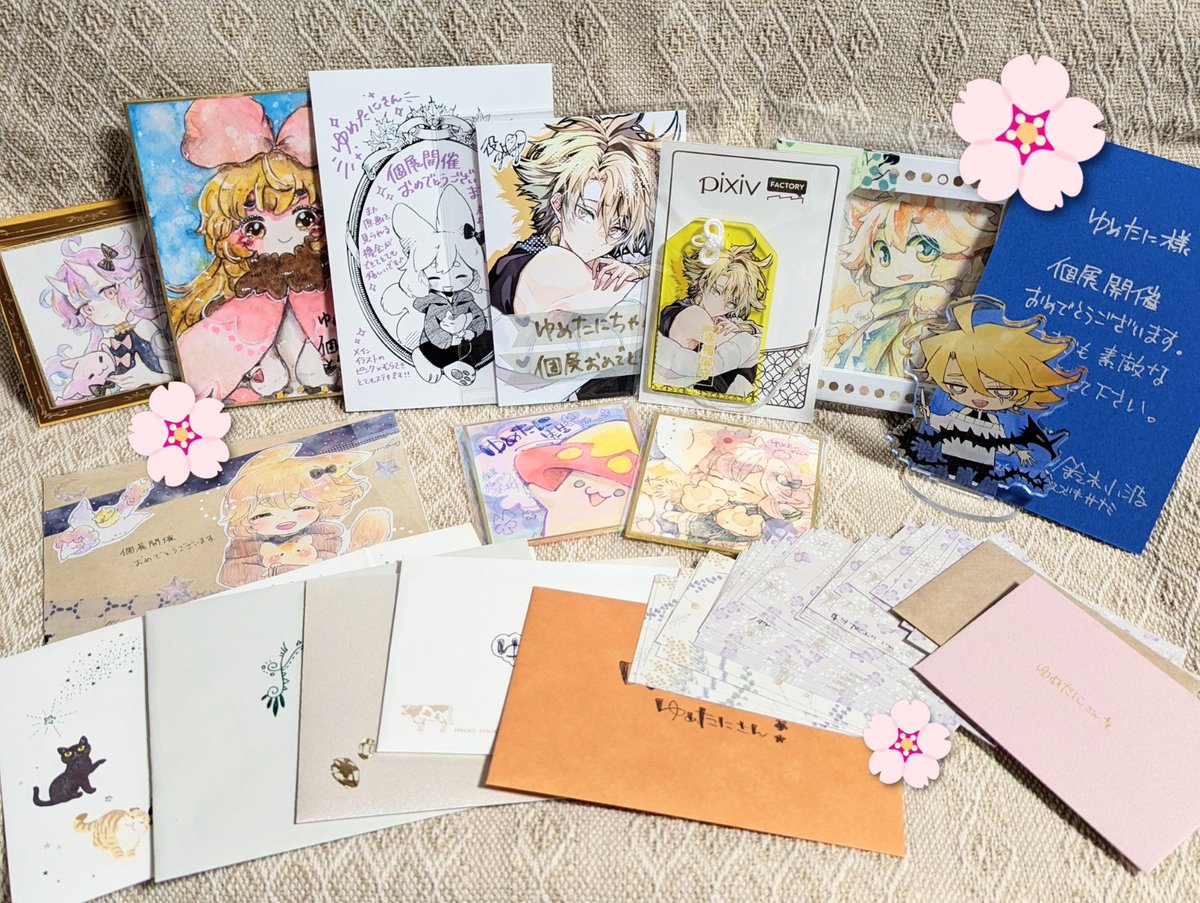 yumetonoyuiya's tweet photo. 個展で頂いたお菓子&amp;のんちゃんのファンアート（真凛さん作）、そして会期中に頂いたお手紙やメッセージカード、素敵なイラストの数々です！
本当にたくさんの元気をありがとうございました！とても励みになります🌸 https://t.co/z7h8fWV6kp