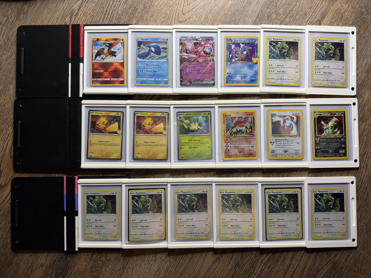 The Pok Book  A collapsible mini binder to store your cards!  Currently  have them in Pokball, Masterball, and Team Rocket versions.  Comes with 6  or 12 panels  Opens