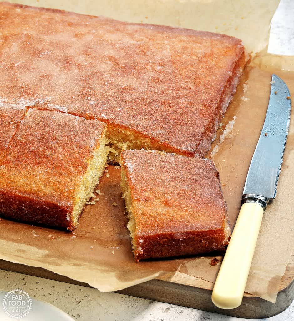 FabFood4All's tweet photo. This is the first cake I ever baked at school. I was somehow drawn to the comforting nostalgia of my school days and decided to spread the joy! Lemon Drizzle Traybake Recipe (All-In-One Method) https://t.co/KnbjEJOdrY #traybake #lemoncake #cake https://t.co/F41ZNr28YZ