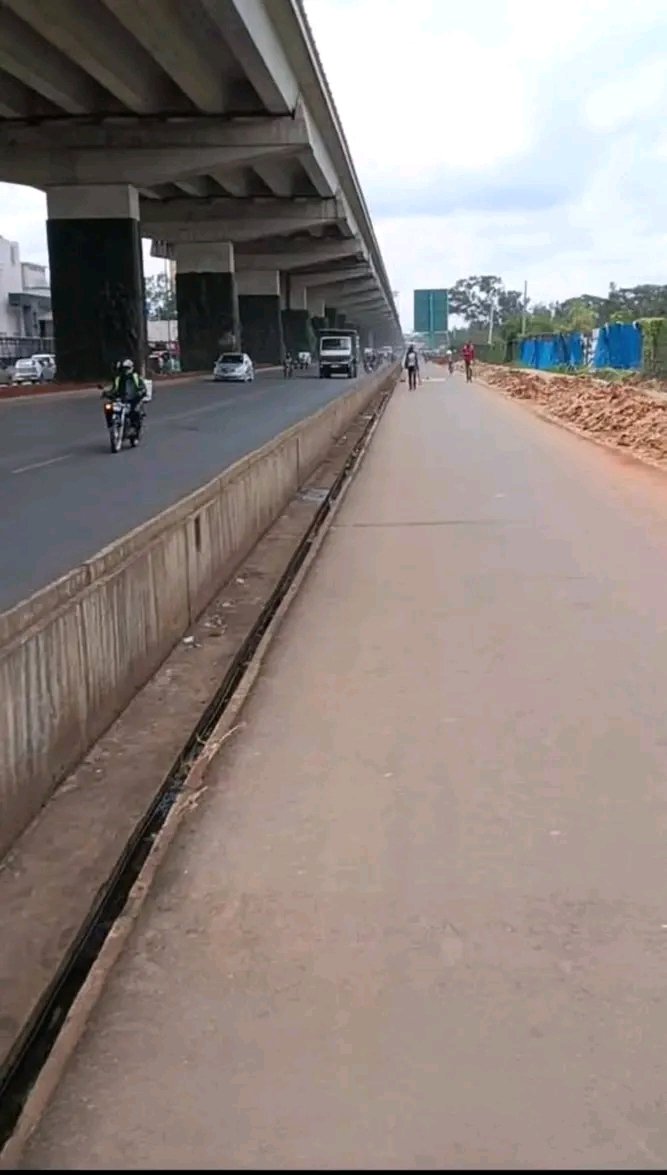 NAIROBI EXPRESSWAY EXPOSED 

This is what the actual design for the pedestrian &amp; cycle lane under the expressway looked like:

Vs what KURA actually delivered:

Pure shoddy work. Clear lapses in standards and corruption at KURA that has robbed Kenyans of quality infrastructure we