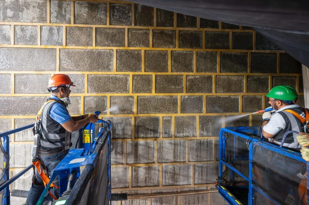 The Kiswah of the Kaabah being lifted in preparation for Hajj