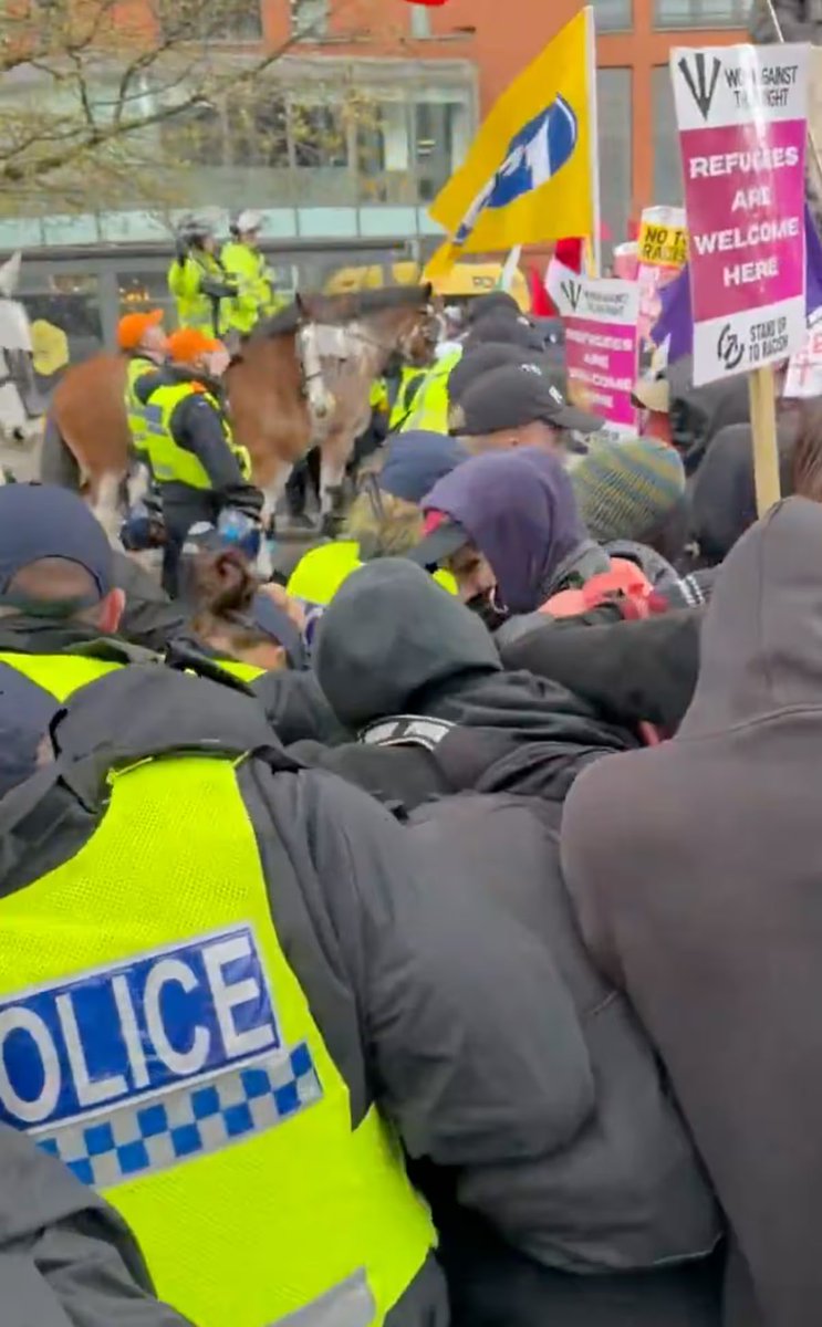 BPINewsOrg's tweet image. Britain First supporters marched through Manchester city centre as hundreds of officers deployed, following 11 arrests at a previous protest. 

Counter demonstrators gathered and tram services were suspended after tracks were blocked. 

#Manchester