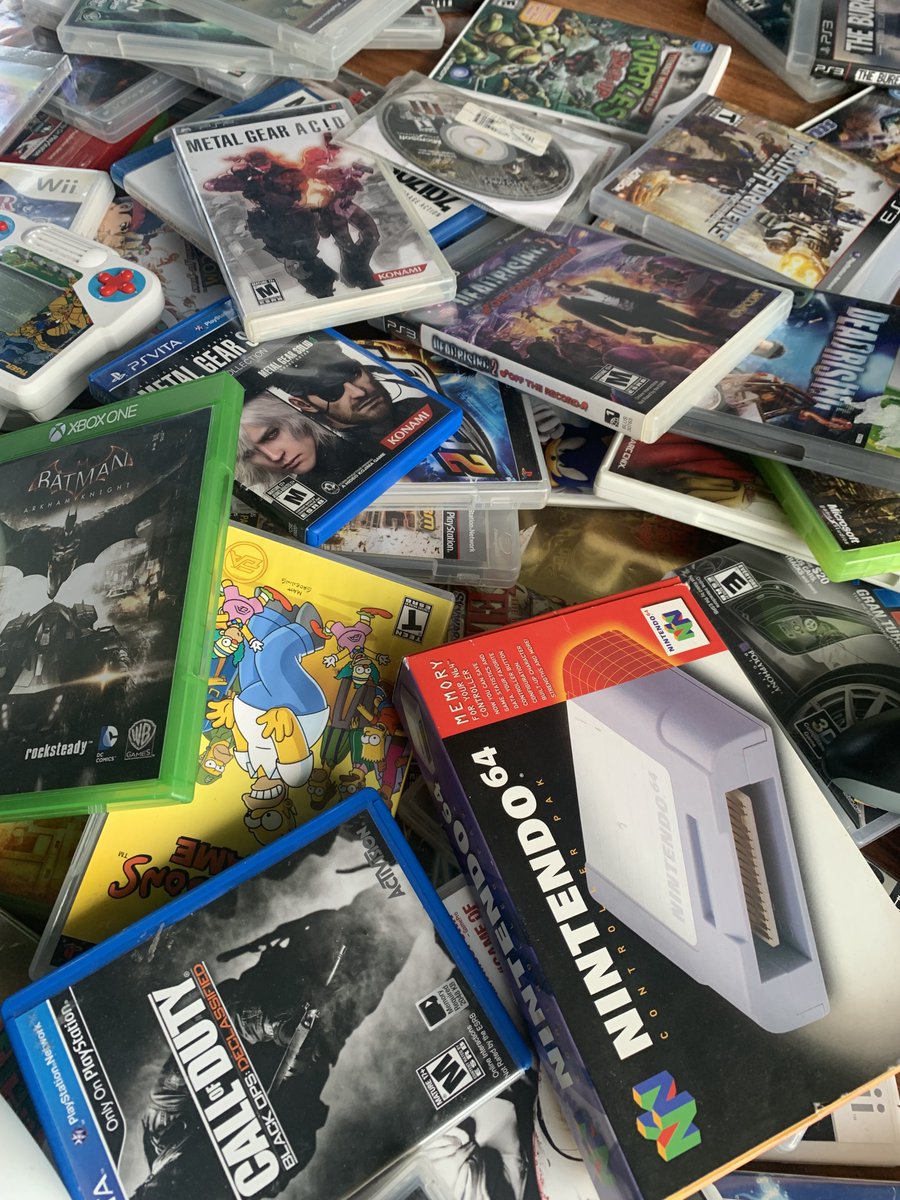 Retrega_Reset's tweet image. Is this a pile of games or the inside of my brain? You decide #RetroGames #CallofDuty #PSVita #N64 #AgeofEmpires #MetalGear #Batman #DeadRising #TheSimpsons #GamingLife #Gamer