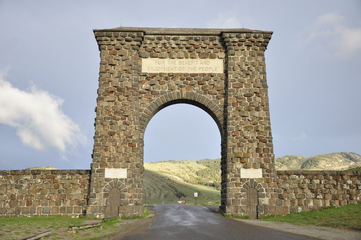 The Roosevelt Arch is a rusticated gate at the north entrance to Yellowstone National Park in Gardiner, Montana, United States. Constructed under the supervision of the US Army at Fort Yellowstone, its cornerstone was laid down by President Theodore Roosevelt in 1903. The top of