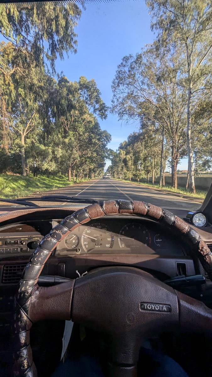 Barlozi's tweet photo. 4. 9:30 AM β Ravine - Eldoret.
Altitude: 2,500m. Boost: strong. Smile: wide.
Thin air? Bomori didn't care. So far so good, Turbo spooling coz of the cold, Sunrise. Ae100 ni JereSonko Red. Fuel top up 2,470/= Total Eldoret https://t.co/VyWGvmsw9C