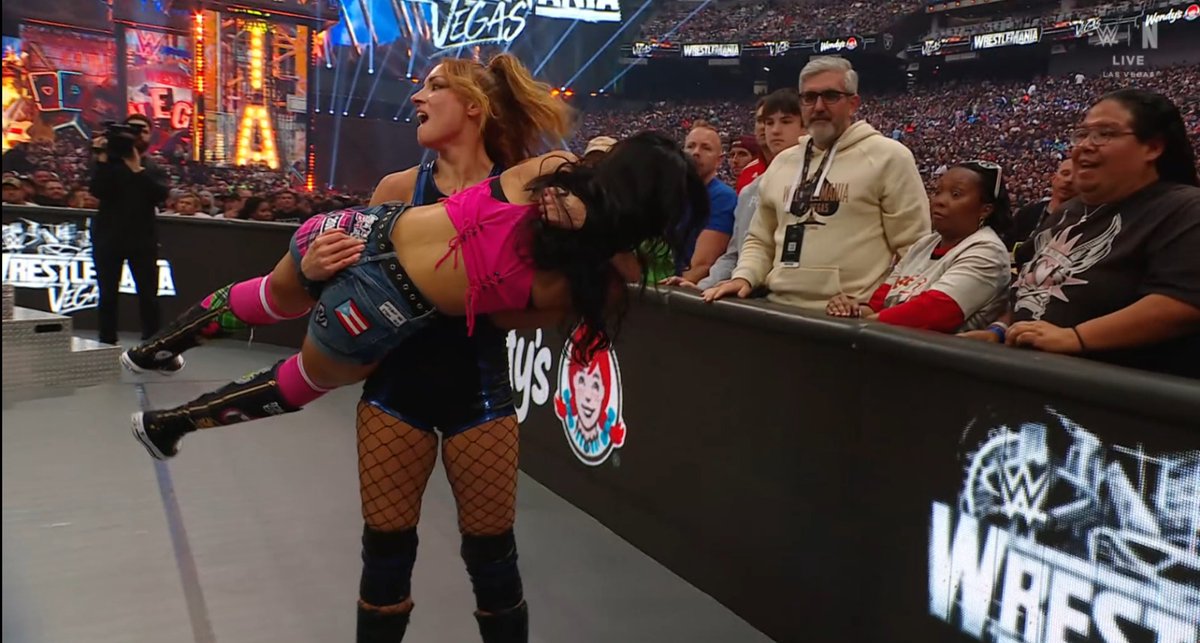 SKWrestling_'s tweet photo. AJ Lee sent into the barricades.
#WrestleMania #WrestleMania42 #ManiaWithSK https://t.co/HrsYrTEbuy