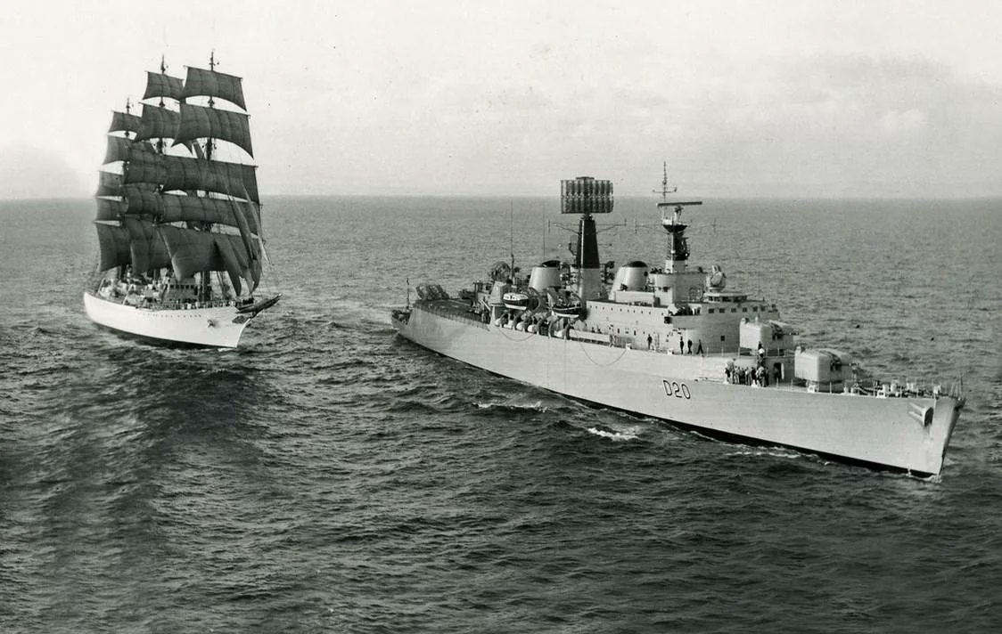 The County class destroyer HMS Fife escorts the Argentinian training ship ARA Libertad in 1968.

Libertad had traveled across the Atlantic to visit Europe during her 1968 training cruise. During her transit of the English Channel she recieved an escort from the Royal Navy.

ARA