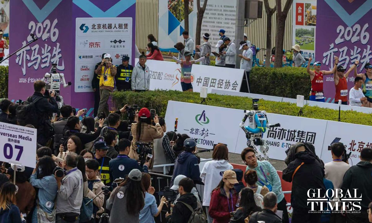 globaltimesnews's tweet image. The second #humanoid robot half marathon took place in Beijing E-Town on April 19, 2026. Over 100 robot teams participated, including five international teams. A remotely controlled "Lightning" robot from the Honor team was the first to cross the finish line, clocking 48 minutes