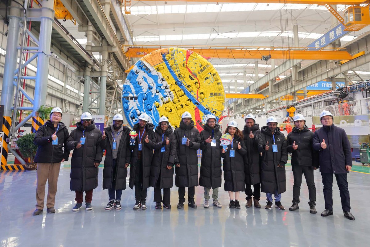 CRSGUganda's tweet photo. On February 10, 2026, African employees from CRSG visited China Railway Engineering Equipment Group (CREG). They stepped into the assembly workshop of the "National Heavy Machinery‌"—the tunnel boring machine (TBM)—to learn about its construction principles and assembly process🚇 https://t.co/CevpD5fw3N