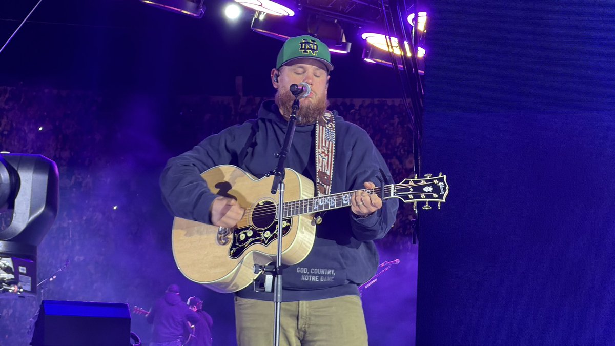 securitydavec's tweet photo. It was definitely my kinda Saturday night with @lukecombs  at Notre Dame! First row pit! (@DierksBentley too!) https://t.co/MhwVQ69Ewd