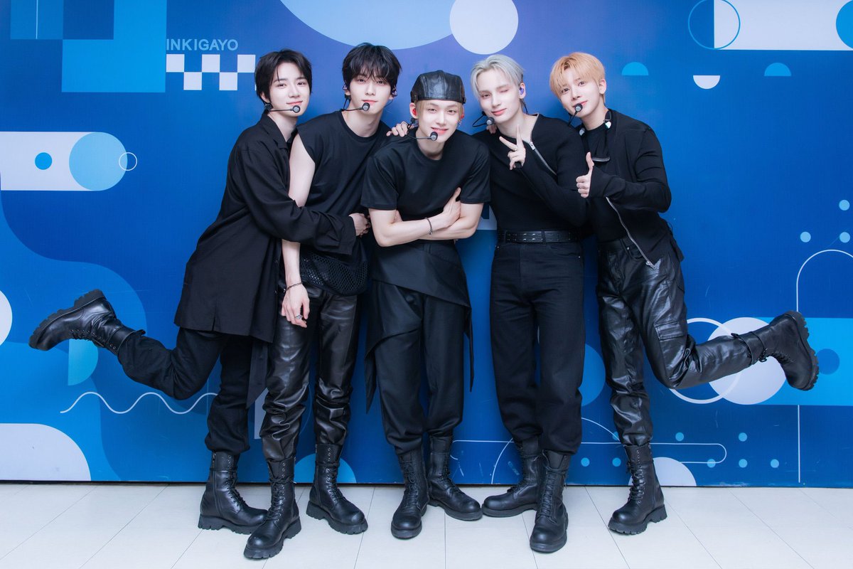 txt is spiritually a gg bc this is how they pose even in all black leather pants the most bg looking ass outfit