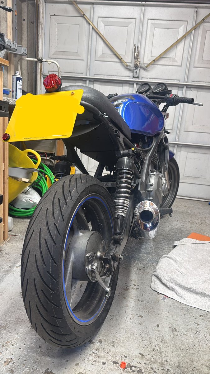 BikerDad67's tweet photo. My son, @CammyRisden has gone a bit quiet here on 'X' but who can blame him what with new baby and a rebuild of his #ER5! He didn't like the look so stripped it down, designed & made an electrics tray, rebuilt clocks and fabricated an exhaust. I'm liking it. #Kawasaki #CafeRacer https://t.co/u6lUq9Wyz1