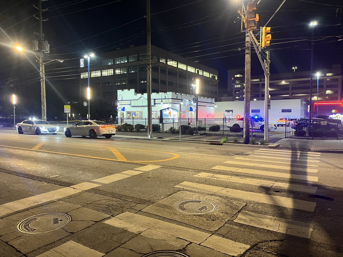 TravisShotIt's tweet photo. IMPD is at the scene of a shooting at the White Castle on South St. in downtown Indianapolis.  Shortly after 3am, three persons were shot, one is in critical condition.  IMPD says this is an isolated incident. @WTHRcom https://t.co/OcdPubXC7J