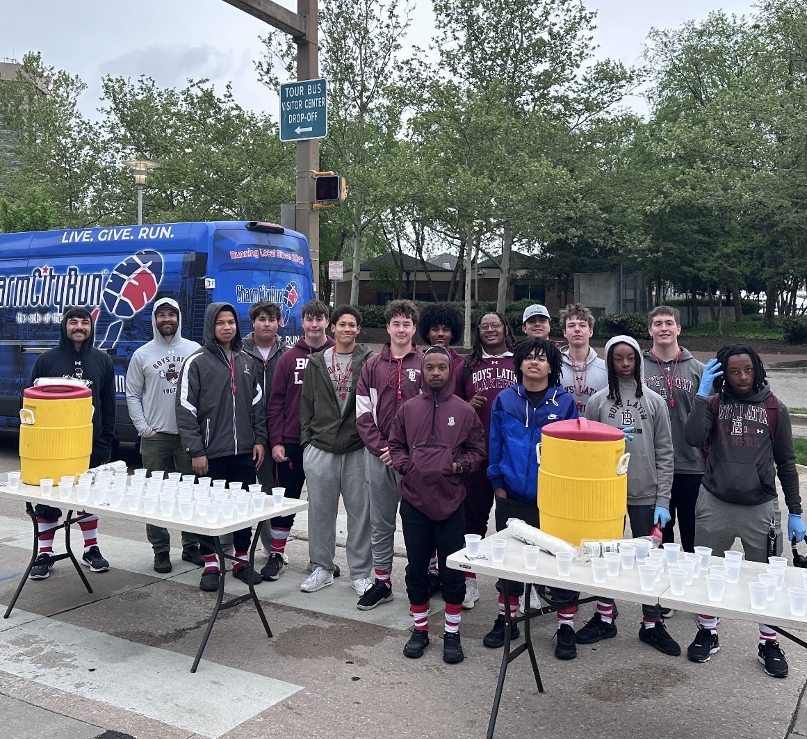 BoysLatinFB's tweet photo. This morning members of our Program volunteered with @RMHCMaryland to support runners and families 🖤#BiggerThanBall || #EQV🪓 https://t.co/XHHZepGvA9