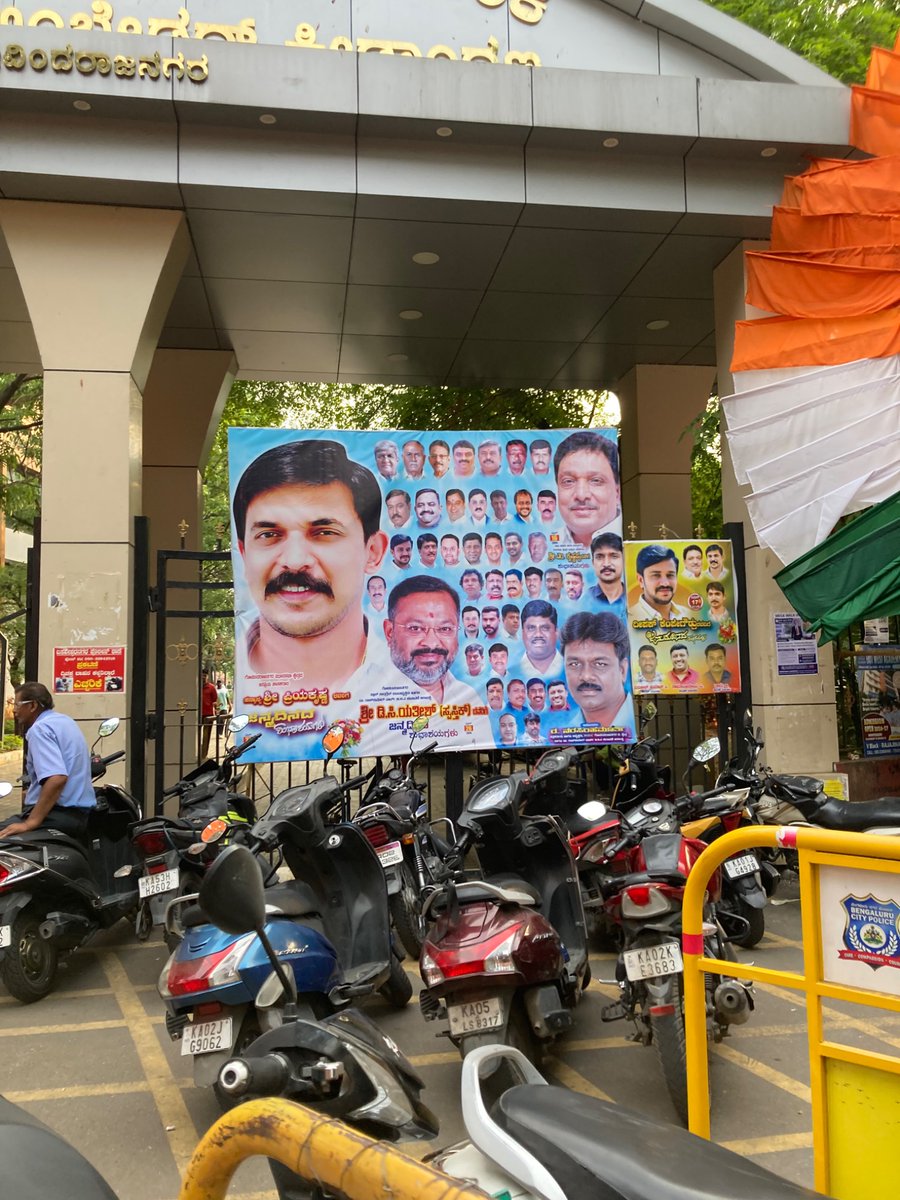 ComplaintRaja's tweet photo. @GBA_office means half assed work. They have removed flexes of Umesh Shetty (birthday over) and left Priyakrishna’s flex (birthday pending). Shameless a**holes. 
@ChristinMP_ @RCBengaluru 
@ICCCBengaluru location Ambedkar stadium, Basaveshwarnagar. Useless ARO Arun Kumar. https://t.co/O8QxyTKviW