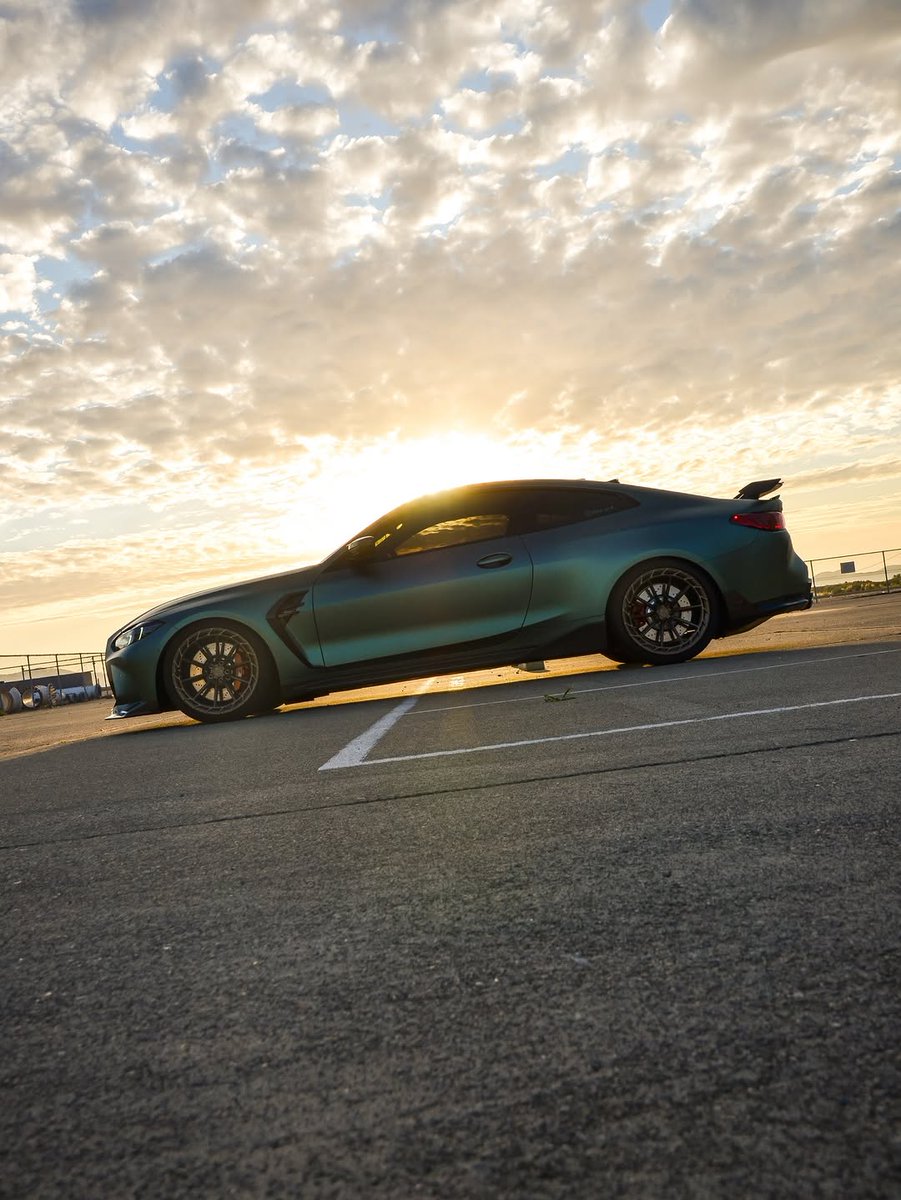 speedfreakshow1's tweet photo. BMW M4 Competition Coupé glowing in Individual Urban Green under that golden hour sky.This is what dreams look like. 🔥🔥 https://t.co/T8Mz8dpbA2