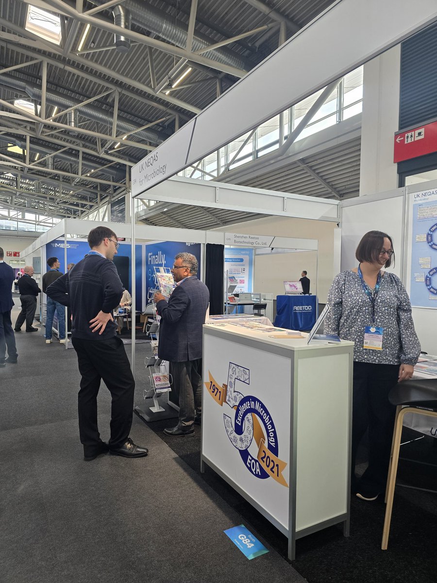 UKNEQASMicro's tweet photo. Day 2 of the exhibition area at #ESCMIDglobal2026 and we @UKNEQASMicro are busy speaking to delegates about all things #EQA. Come visit our team in Hall B2 Booth G84 👨🏼‍🔬👩🏽‍🔬🧫🧬🧪 https://t.co/xl53SQ04f7