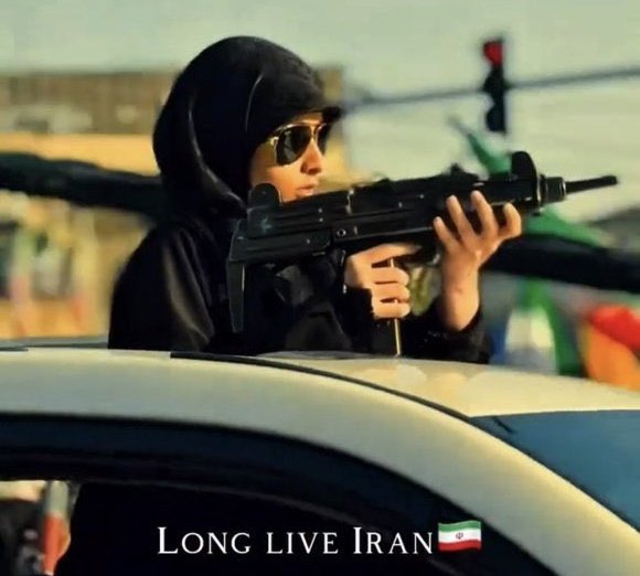 DrEliDavid's tweet image. Priceless: IRGC published a propaganda photo showing a Basij woman with an Israeli Uzi submachine gun 🇮🇱