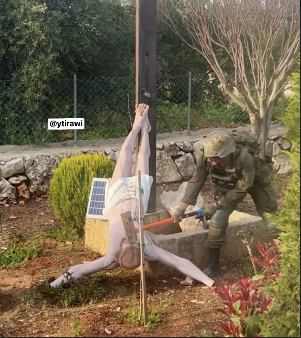 Parodyjeffx's tweet photo. THIS IS SATANIC. 

An Israeli soldier smashed a Jesus Christ statue in southern Lebanon during operations.

We can’t live with these people. https://t.co/wnNjrkAVZK