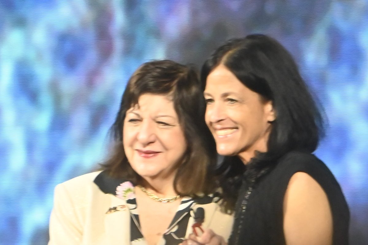 bobriter's tweet photo. Jill Feldman receiving the Patient Advocacy and Engagement Award from Marge Foti at #AACR26 #AACRSSP https://t.co/oLnavDic3U