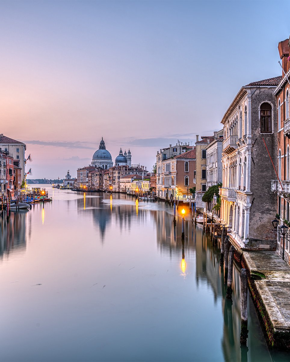 CMFMag's tweet photo. Life slowly awakens in the ancient city of Venice, Italy, in our #SightSeeingSunday picture of the week. Built on 100 small islands, this rustic city has no roads, with residents and tourists alike having to travel on canals. 
Have a peaceful  Sunday! https://t.co/88R8Bua8vv https://t.co/tfsDcQPpgU