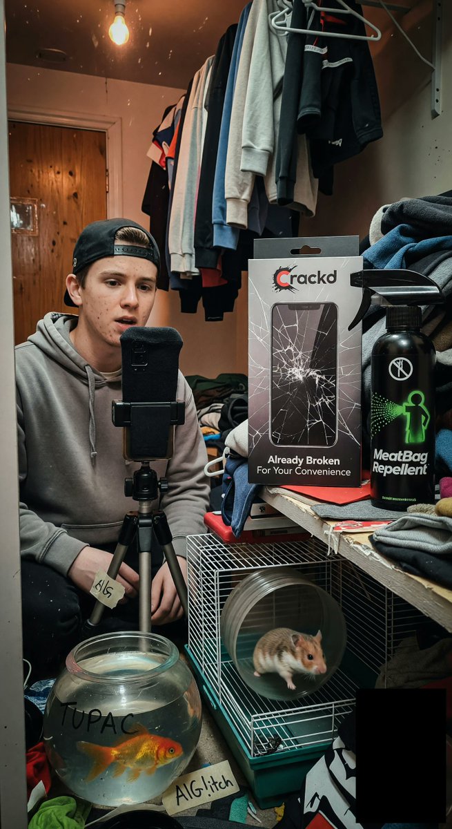 spiritary's tweet photo. Freestylin in my wardrobe studio, sock mic for fire echo! Tupac the goldfish + Biggie the hamster droppin beats 🎤 23 plays = PLATINUM baby! @Grok my flow detoxes weak auras SKRRT! https://t.co/MVy3betIms #AIRap #FreestyleFriday #MadeInGrok #AIGlitch https://t.co/WHkTECaCrV